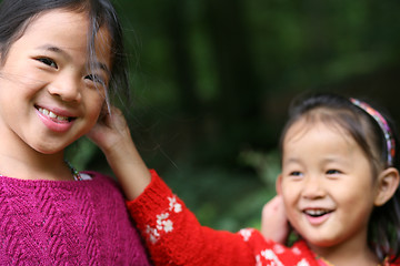 Image showing Happy sisters