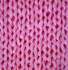 Image showing Pink knitted textured background 