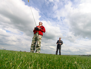 Image showing Two Man controls RC gliders