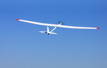 Image showing RC glider flying in the blue sky