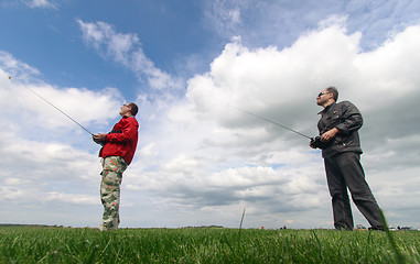 Image showing Two Man controls RC gliders