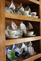 Image showing China Cabinet full of Cups