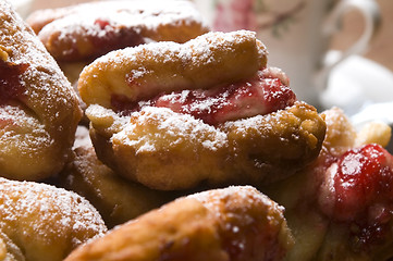 Image showing Dough with marmelade on wooden board