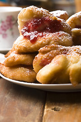 Image showing Dough with marmelade on wooden board