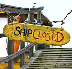 Image showing Old wood notice board/Ship closed