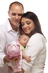 Image showing Young Mixed Race Parents with Baby Holding Piggy Bank