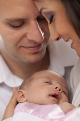 Image showing Mixed Race Young Couple with Newborn Baby