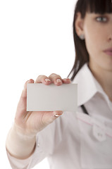 Image showing Girl showing business card in her hands