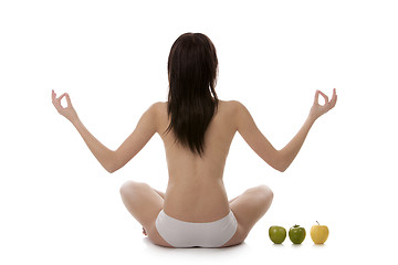 Image showing Girl practicing yoga on white