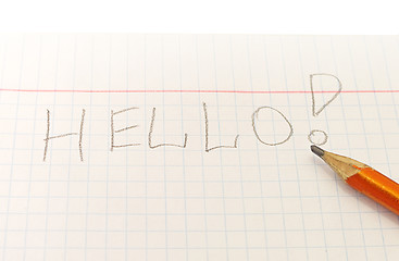 Image showing Text Hello word written by pencil on notebook sheet