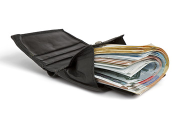 Image showing many banknotes in black wallet