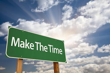 Image showing Make The Time Green Road Sign and Clouds