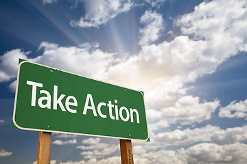 Image showing Take Action Green Road Sign and Clouds