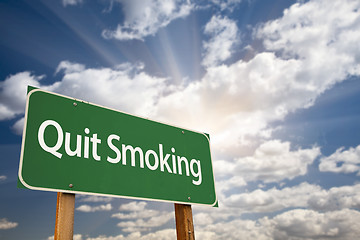 Image showing Quit Smoking Green Road Sign and Clouds