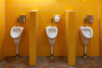 Image showing Three urinal in the bathroom