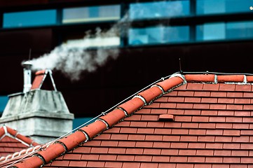 Image showing Small chimney with smoke