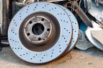 Image showing Rusty old car parts with metal junk