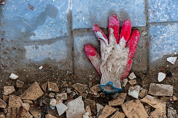 Image showing Glove with red fingers