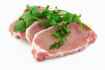 Image showing Pork loin steaks with herbs