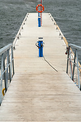 Image showing Wooden mooring for yachts