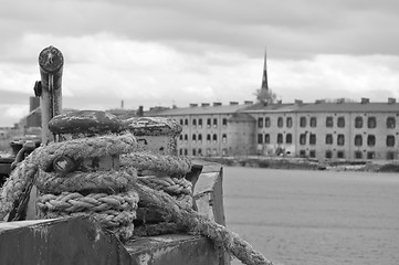 Image showing Sea knot with a rope on a background of a fortress 