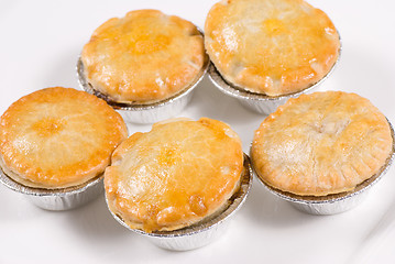 Image showing Several pies