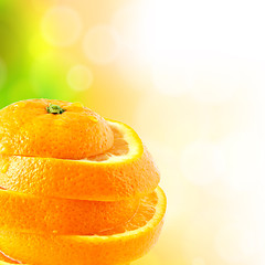 Image showing juicy orange cut into slices