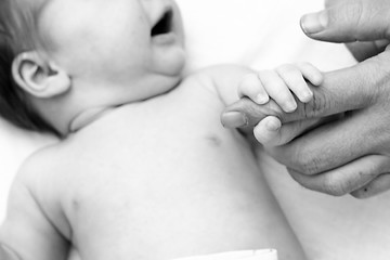 Image showing hands of the baby