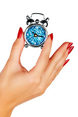 Image showing woman hand with a clock