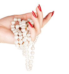 Image showing hand of woman with pearls