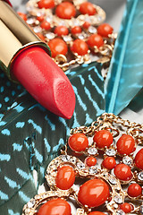 Image showing coral pink lipstick close-up