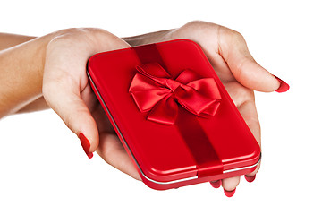 Image showing red gift box in woman's hands