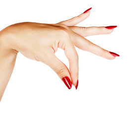 Image showing hands of woman with red manicure