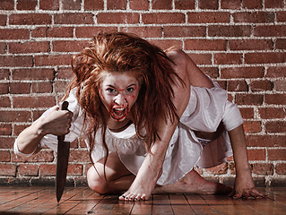 Image showing Horror Themed Image With Bleeding Freightened Woman