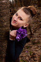 Image showing girl with snowdrops