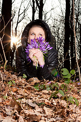 Image showing girl with snowdrops