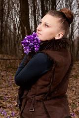 Image showing girl with snowdrops