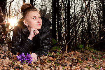 Image showing girl with snowdrops