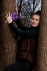 Image showing girl with snowdrops