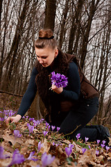 Image showing girl with snowdrops