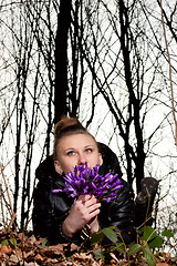 Image showing girl with snowdrops