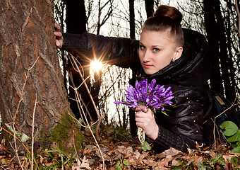 Image showing girl with snowdrops