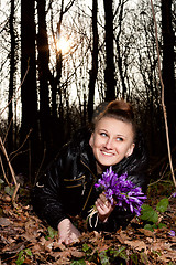 Image showing girl with snowdrops