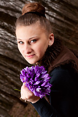 Image showing girl with snowdrops