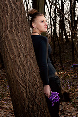 Image showing girl with snowdrops