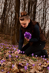 Image showing girl with snowdrops