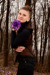 Image showing girl with snowdrops