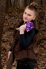 Image showing girl with snowdrops