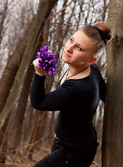 Image showing girl with snowdrops