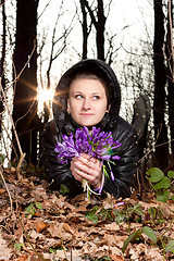 Image showing girl with snowdrops